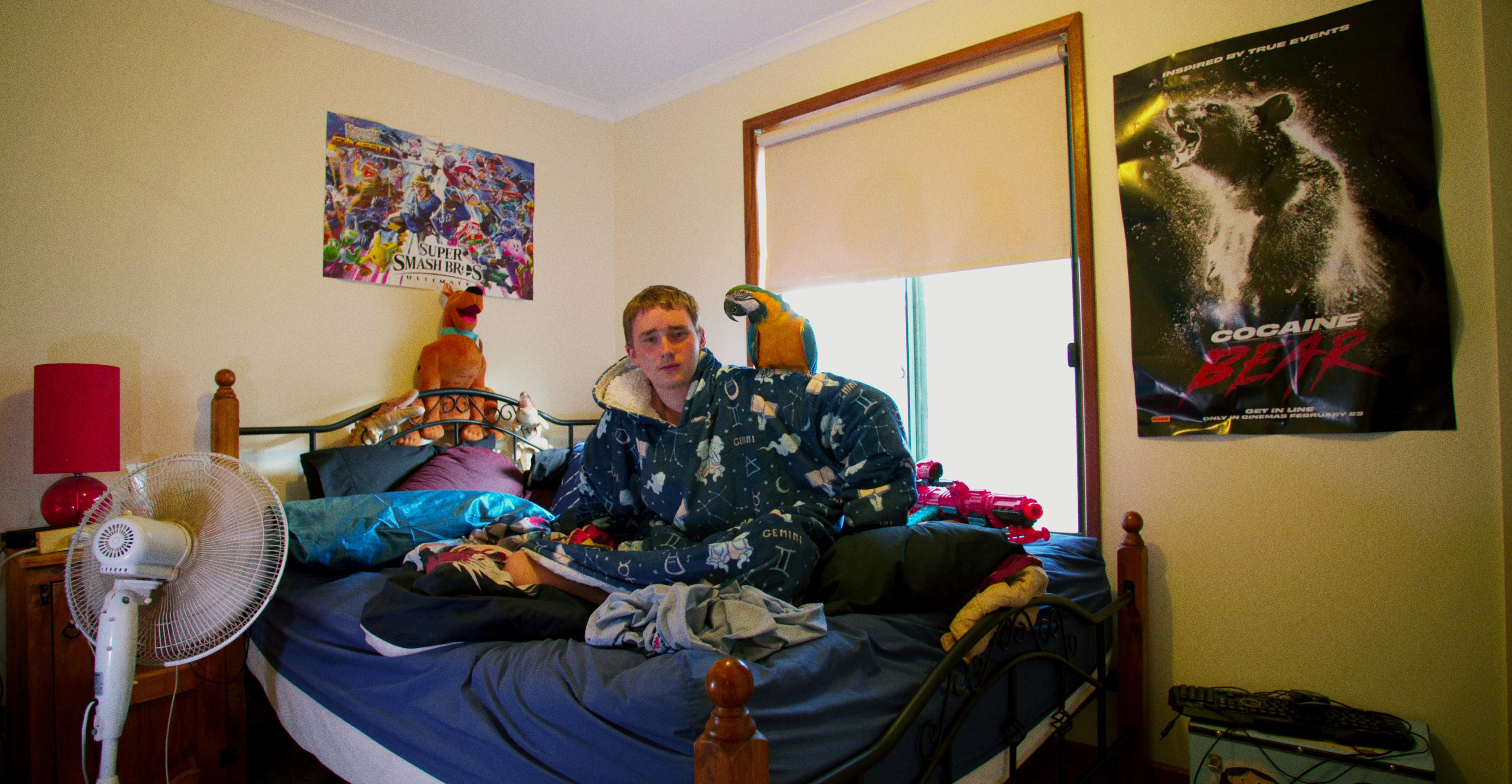 Teenager in his bedroom