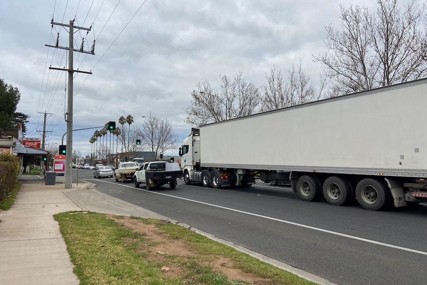 A truck driving on Midland Highway.