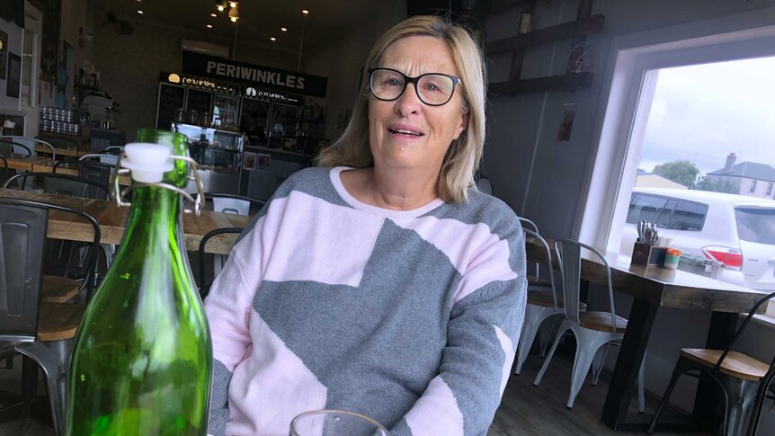 Port MacDonnell accommodation business owner Gill Clayfield sits in a cafe in town.