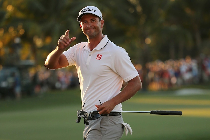 Adam Scott celebrates victory at the WGC event in Miami in March 2016.