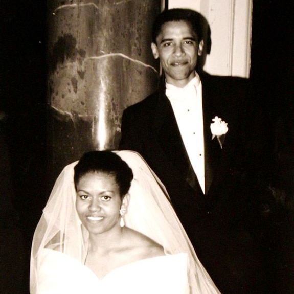 Barack Obama and new wife Michelle pose for a photo on their wedding day in 1992