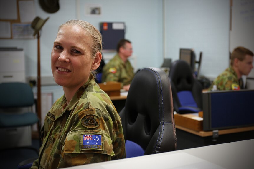 Elizabeth Church at her desk at the 41st Battalion headquarters