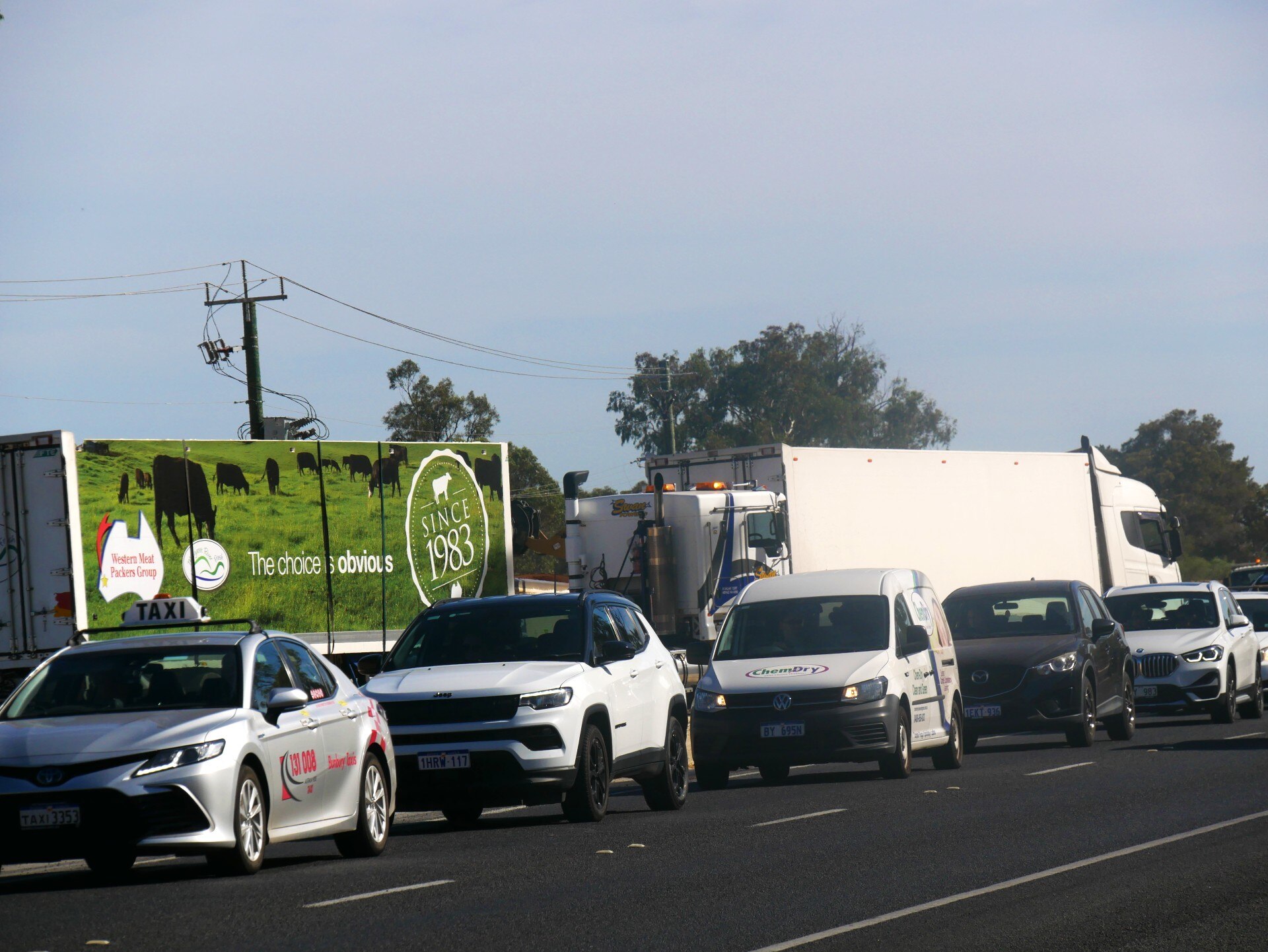 Two trucks and some traffic