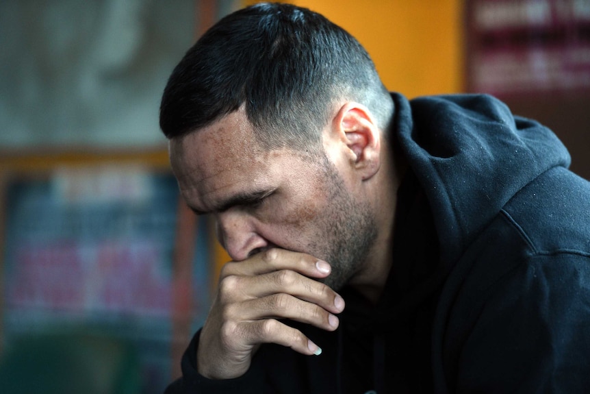 Boycott call ... Anthony Mundine at a media conference at his Redfern gym in Sydney