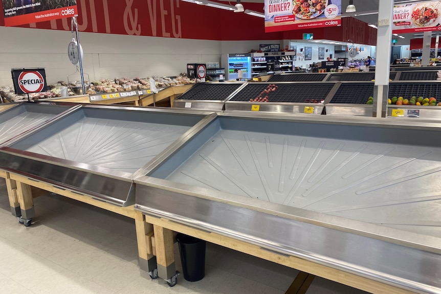 Empty fresh food section at a Coles supermarket in Gladstone