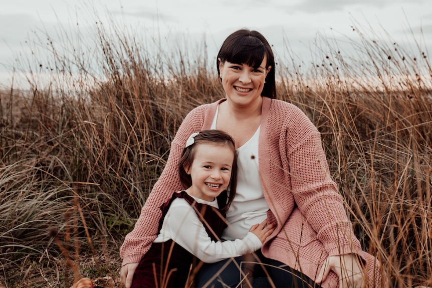 Jess Harden with her daughter at age four after recovering from a food allergy