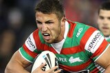 On the burst ... Sam Burgess tries to beat the Knights defence