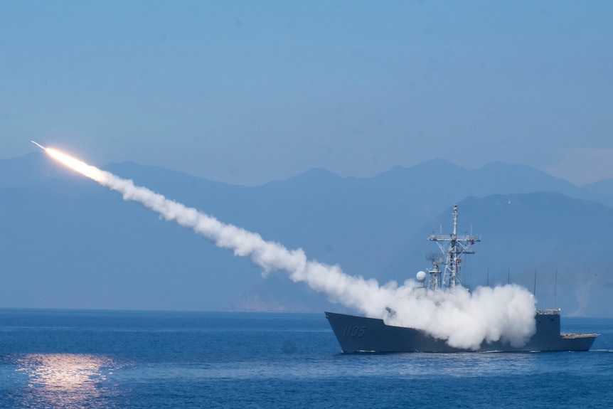 A frigate fires an anti air missile as part of a navy demonstration