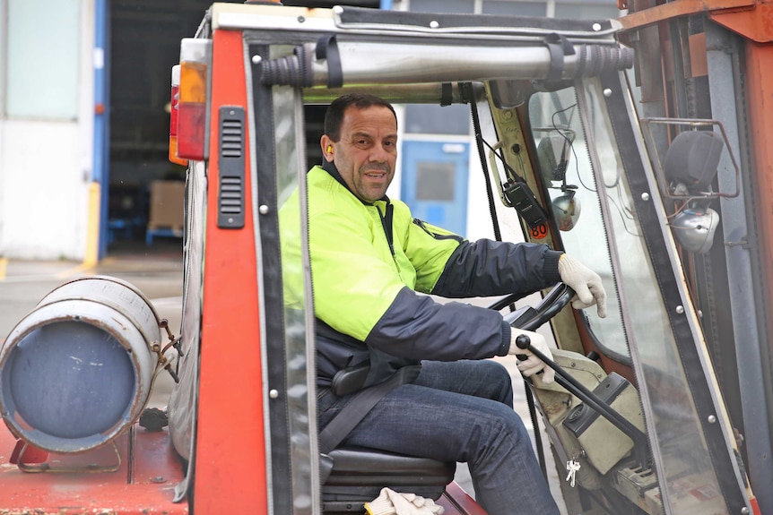 Ford worker Jason drives a forklift at the company in the week leading up to its closure.