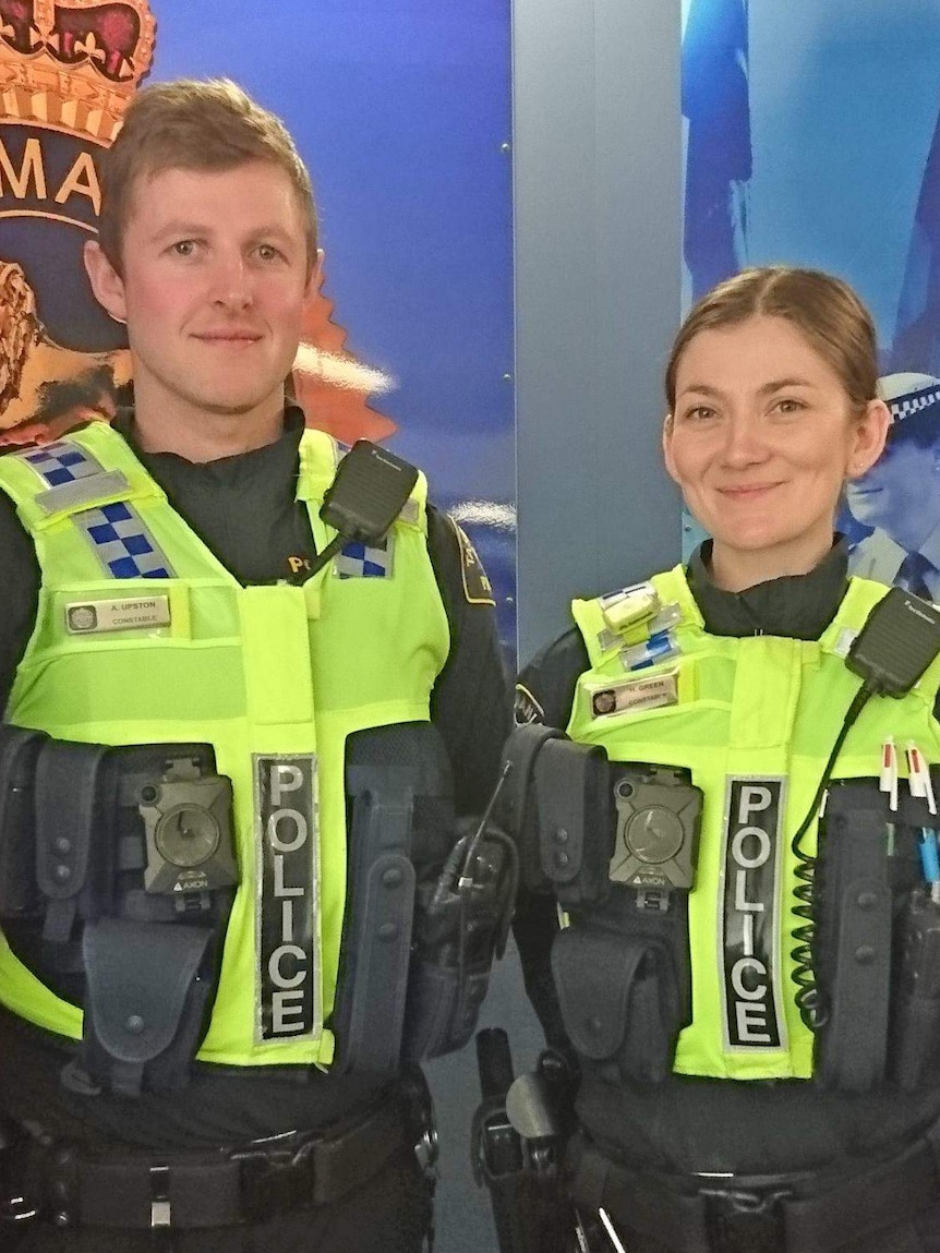 Tasmania Police officers display body-worn cameras, September 2018.