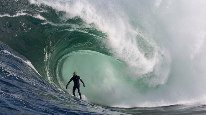 Mick Fanning surfing huge wave at Shipstern Bluff, Tasmania