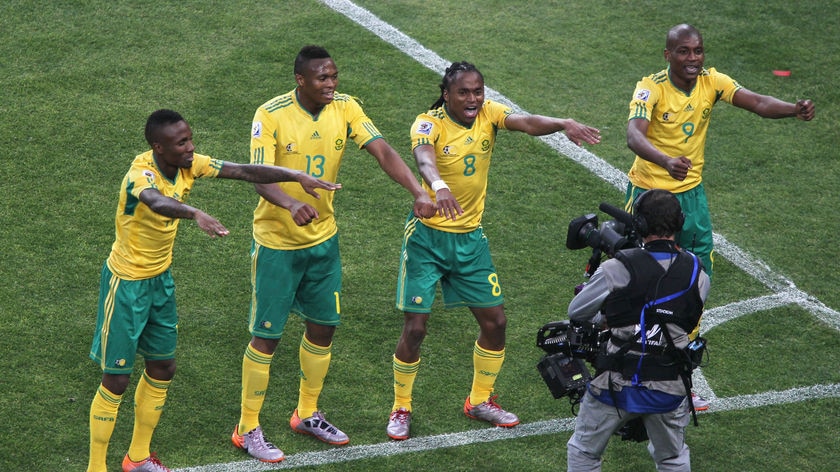 Storming opener: Siphiwe Tshabalala (centre-right) opened the World Cup goal tally with a sumptuous finish.