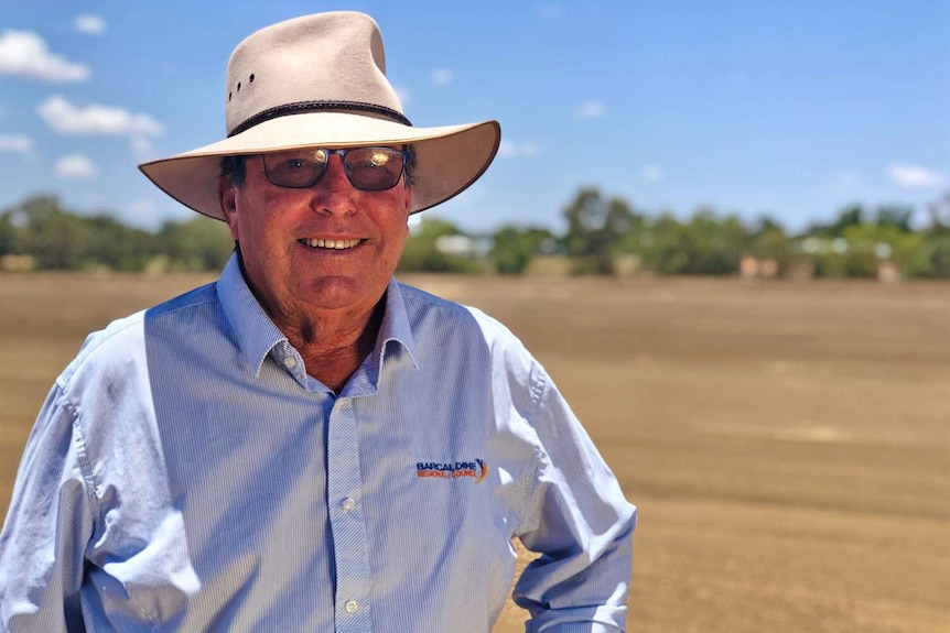 Smiling photo of Barcaldine Mayor Rob Chandler standing outside in the central-west Queensland town.