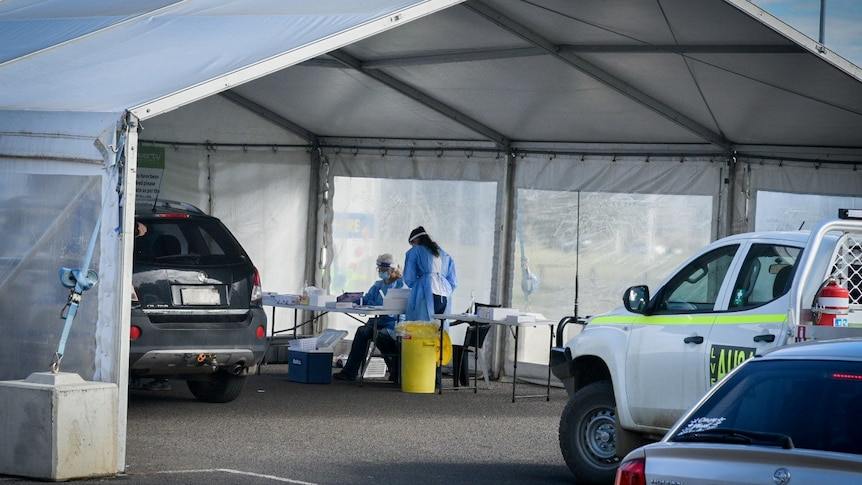 Medical staff manning a drive though testing site in Tamworth