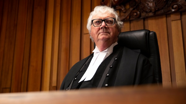 A judge in a courtroom.