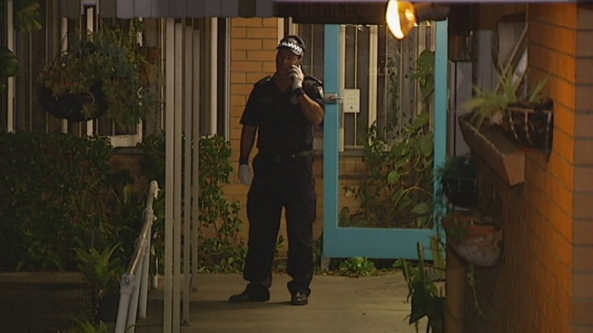 Police at Pinjarra Lodge last night, where four men were stabbed.