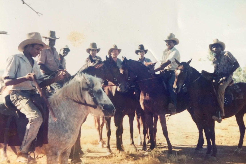 Kimberley station workers on horseback.