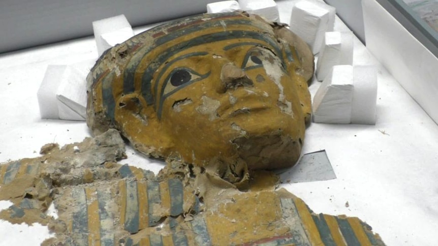 Pieces of an Egyptian sculpture, including a head