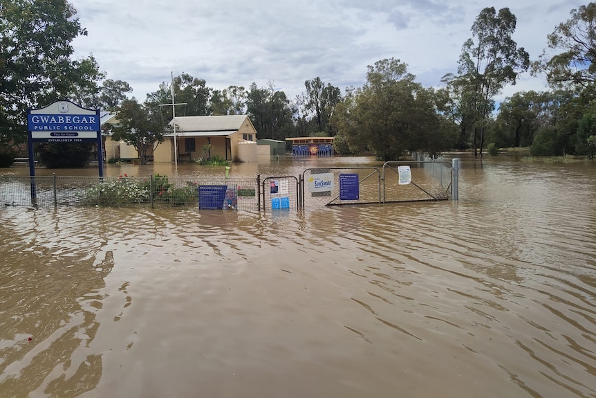 A rural school is inundated with floodwater.