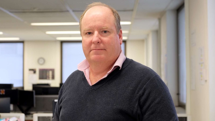 No To Violence head of services Greg Wilkinson in the organisation's Melbourne call centre