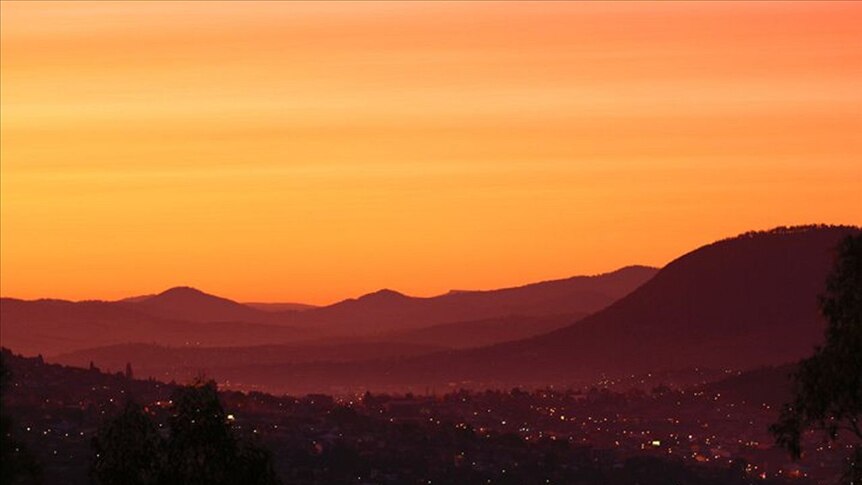 Tasmania had a bright orange sunset as ash from the Chilean volcano drifts over the state.