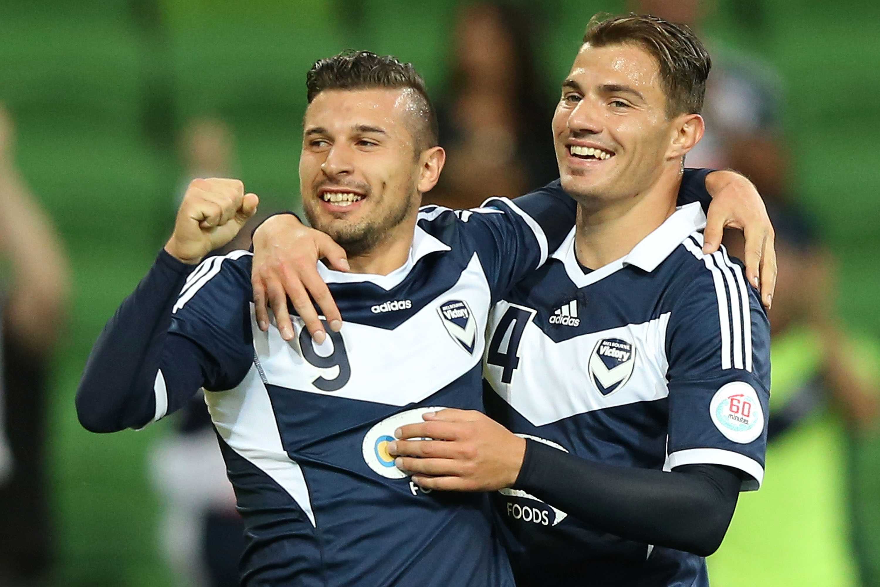 Kosta Barbarouses celebrates a goal for Melbourne Victory