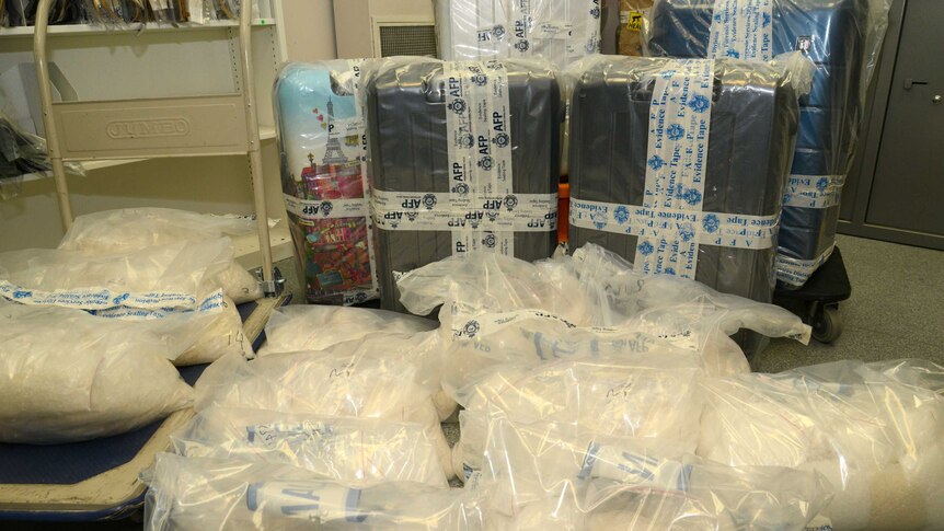 More than 200kg of methylamphetamines seized by police in bags and suitcases.