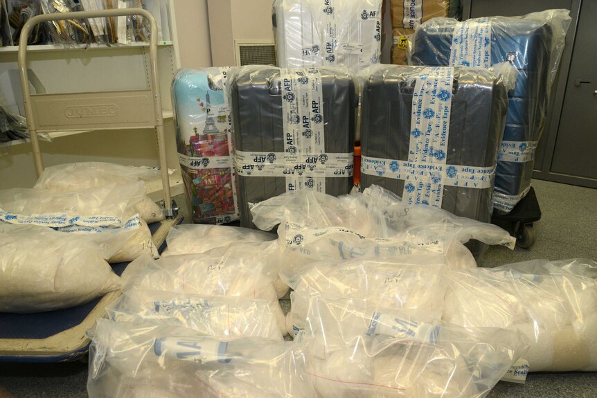 More than 200kg of methylamphetamines seized by police in bags and suitcases.
