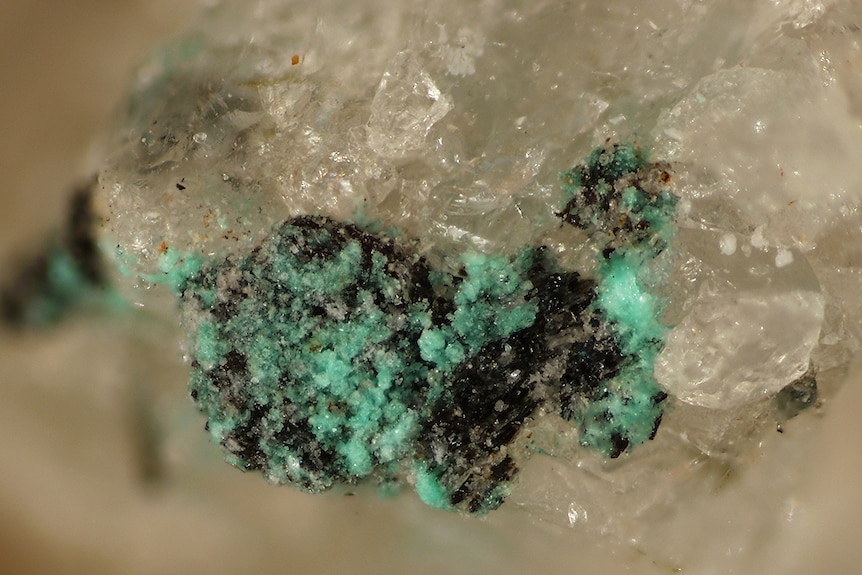 Chalconatronite, a result of quarrying at Mont Saint-Hilairein Quebec, Canada.