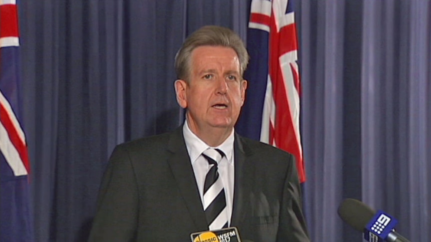 NSW Premier barry O'Farrell confirms he has stood down Finance Minister Greg Pearce