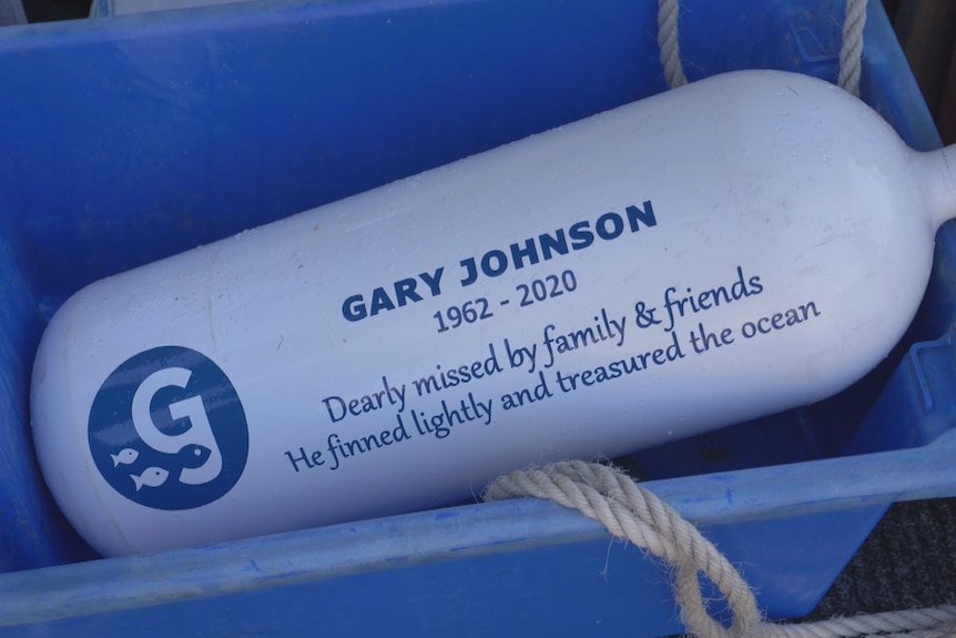 The tank is pictured on the boat, and has a message printed on its side for Gary Johnson
