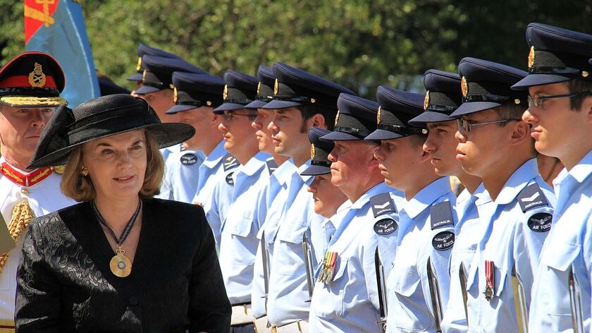 Qld Govenor Penny Wensley AO inspects the honour guard at the Q150 Proclamation Day celebrations in Brisbane.