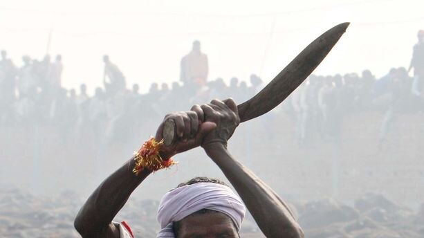 A Hindu devotee wields a khukri