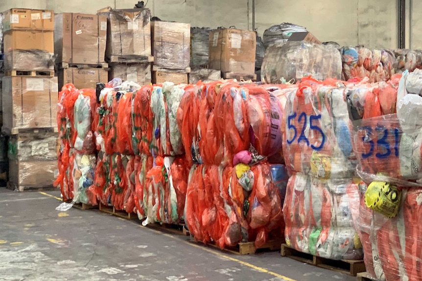 Bales of soft plastics inside a Melbourne recycling factory.