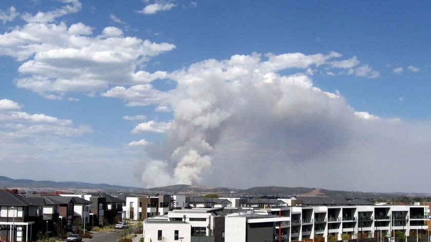 More than 3,000 firefighters are trying to hold containment lines.