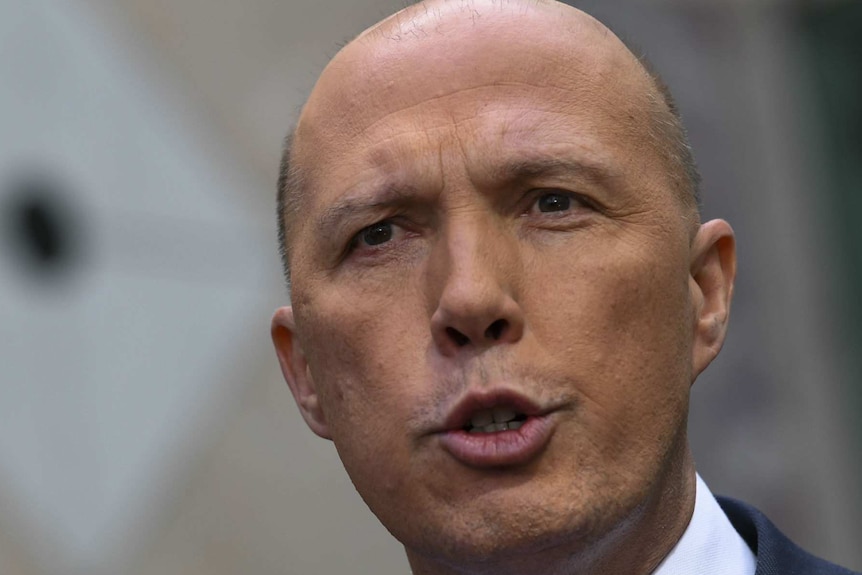 Peter Dutton speaks to the media