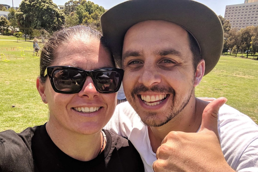 Amy Churchouse with Tim Solly pictured outside in a park