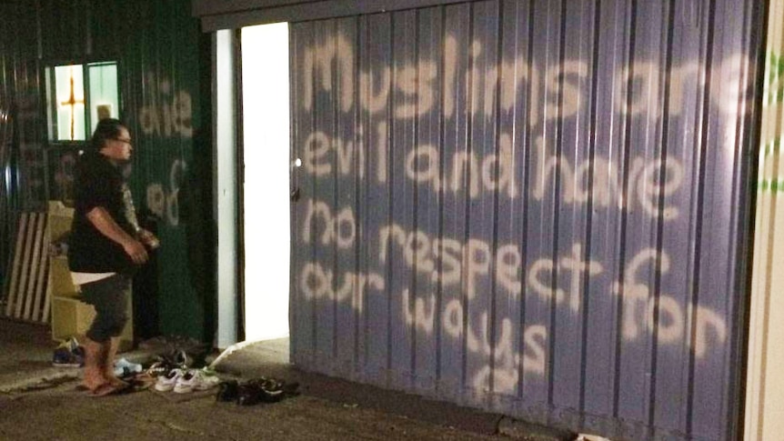 Abusive words spray painted across the entrance to an Indonesian community mosque in Rocklea.
