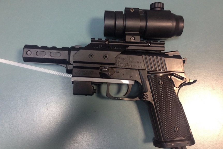 A gun seized in police raids in Gladstone and Tannum Sands in central Qld.