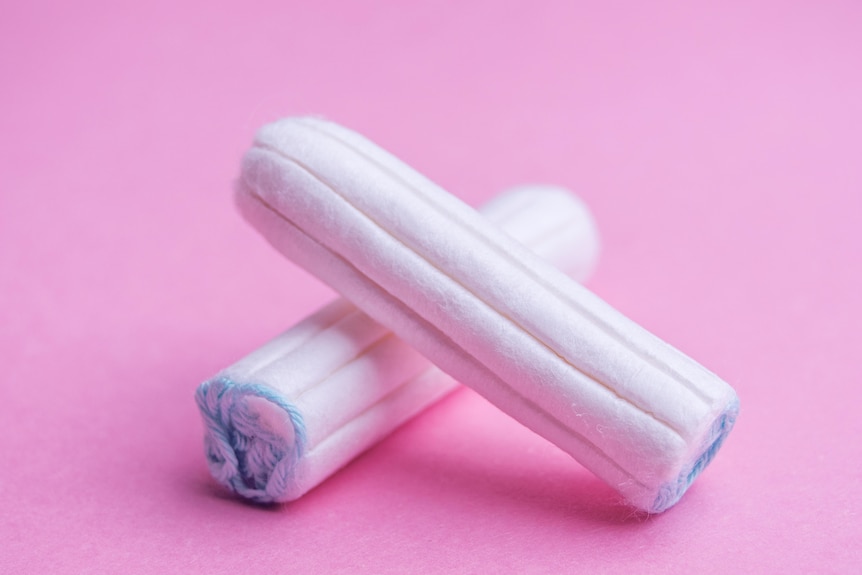 Two Tampons on pink background