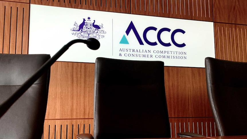 The Australian Competition and Consumer Commission (ACCC) logo in a boardroom at the regulator's office.