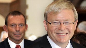 Tony Abbott follows Kevin Rudd after the parliamentary church service in Canberra  (AAP: Alan Porritt)