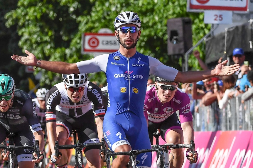 Fernando Gaviria celebrates a Giro d'Italia stage win