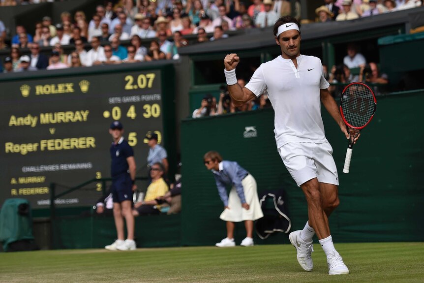 Federer celebrates Wimbledon semi-final win over Murray
