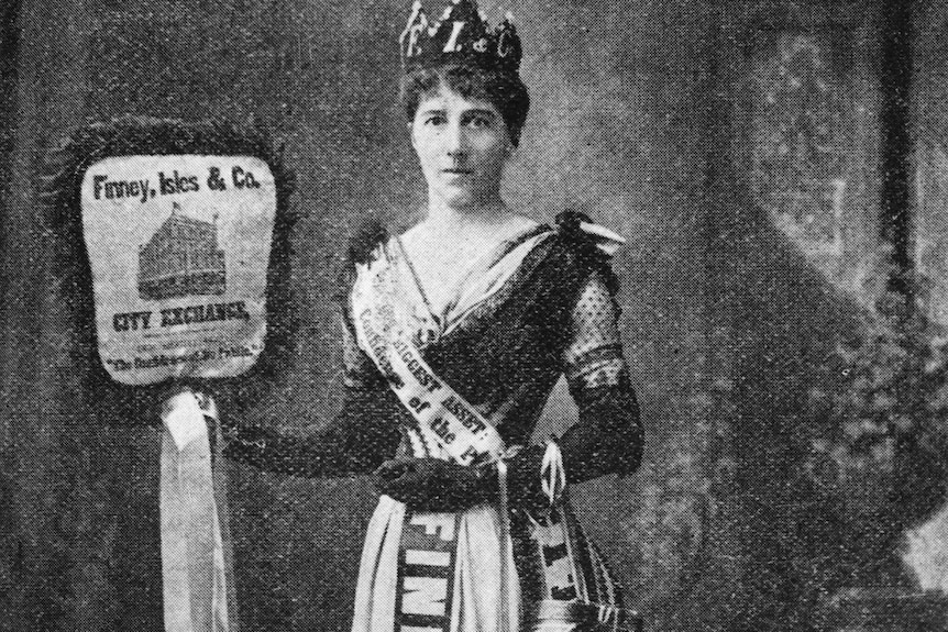 Portrait of Mrs. H. Finn in full Queenly regalia promoting Finney Isles  Co. during Brisbane Poster Ball  Brisbane 1900