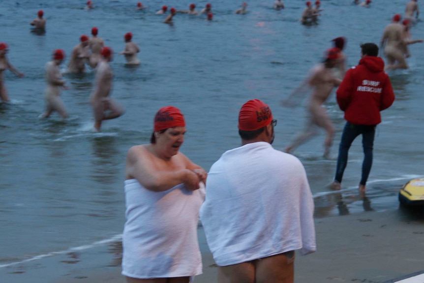 People warm up after Hobart's nude swim