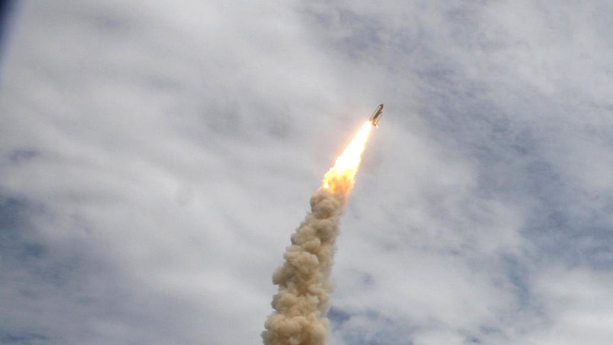 The space shuttle Atlantis lifts off from the Kennedy Space Centre in Cape Canaveral