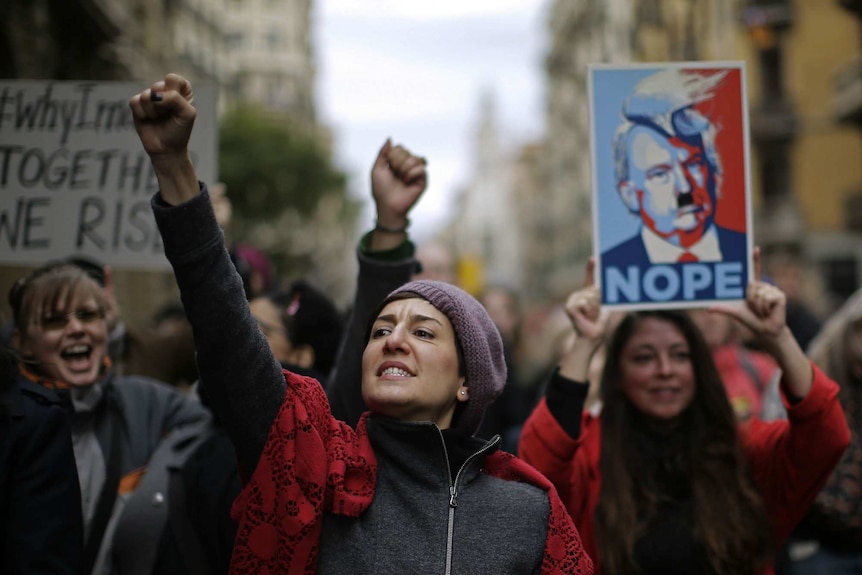 People at the Women's March rally in Barcelona.