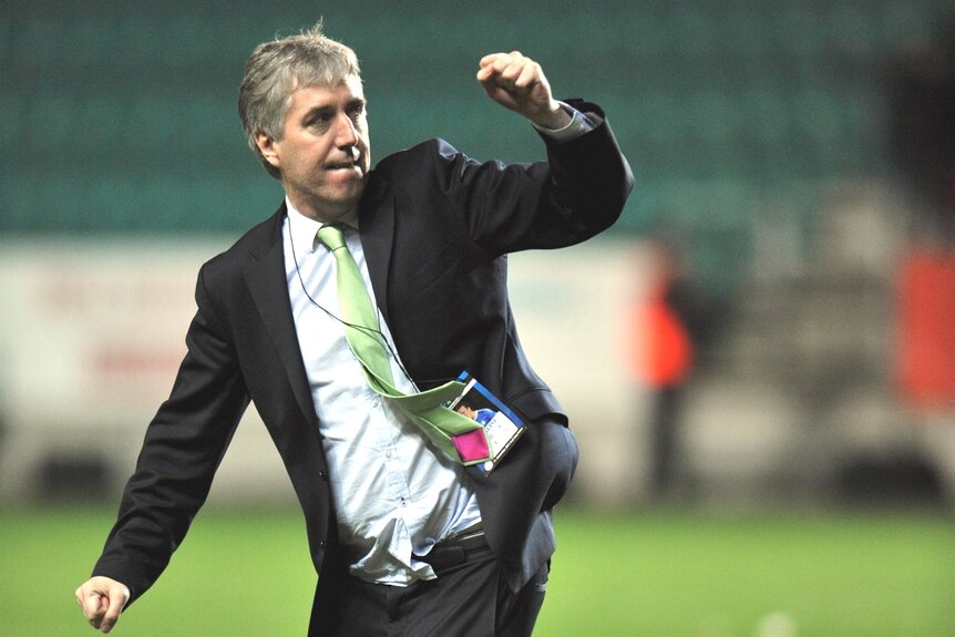 Chief Executive of the Football Association of Ireland (FAI) John Delaney celebrates after the team's victory in a playoff soccer match between Estonia and Ireland in 2011.