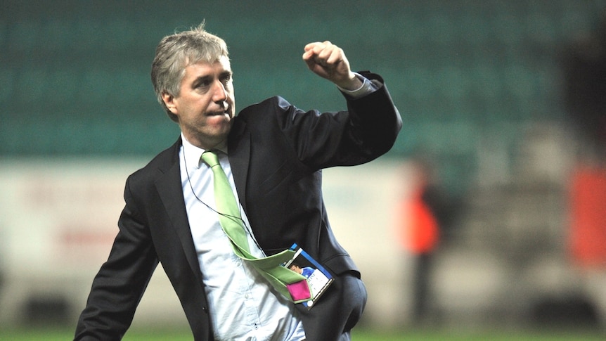Chief Executive of the Football Association of Ireland (FAI) John Delaney celebrates after the team's victory in a playoff soccer match between Estonia and Ireland in 2011.
